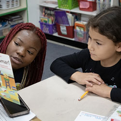 student reading book